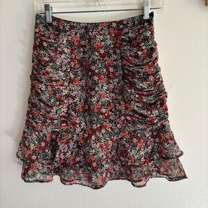Floral ruched mini skirt with ruffle hem